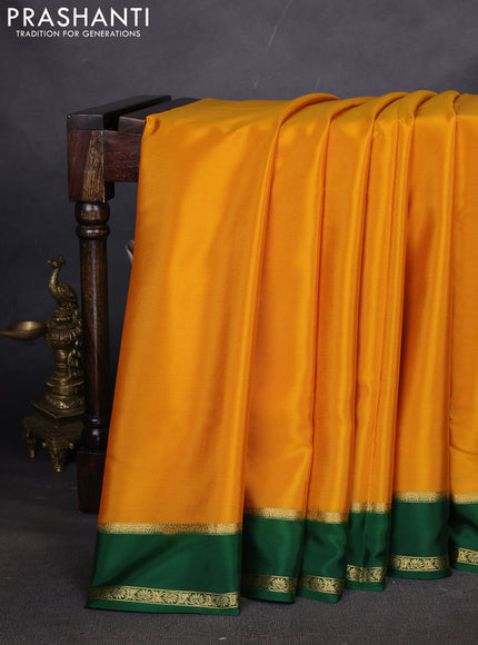 Pure mysore silk saree mustard yellow and green with plain body and rettapet zari woven border