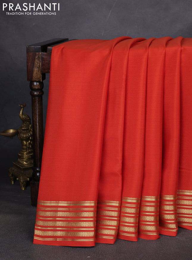 Pure mysore silk saree rustic orange with plain body and zari woven border