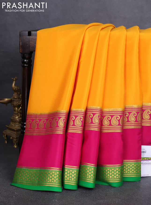 Pure mysore silk saree mango yellow and pink green with plain body and long rettapet zari woven border