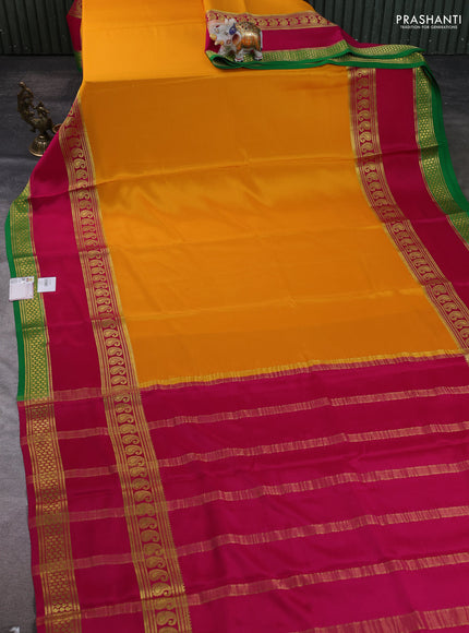 Pure mysore silk saree mango yellow and pink green with plain body and long rettapet zari woven border
