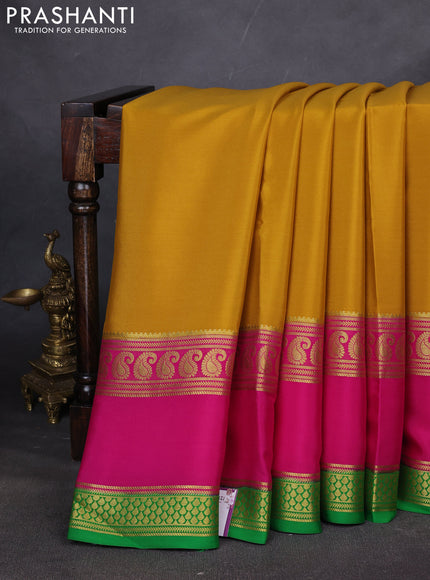Pure mysore silk saree mustard yellow and pink green with plain body and long rettapet zari woven border