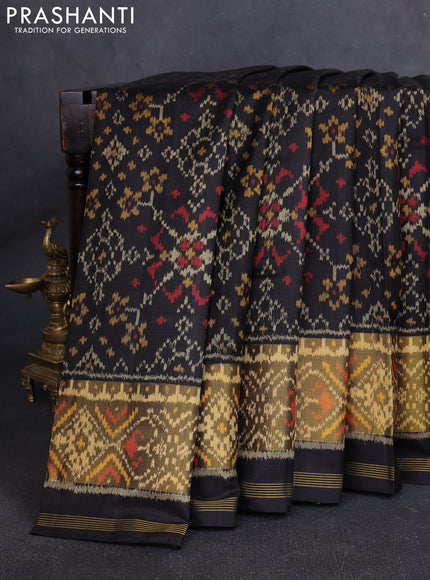 Rajkot Patola Silk Saree black with allover Ikat weaves and ikat zari woven border
