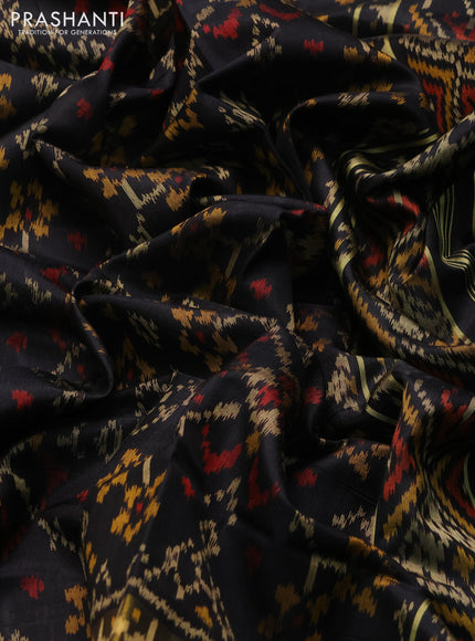 Rajkot Patola Silk Saree black with allover Ikat weaves and ikat zari woven border