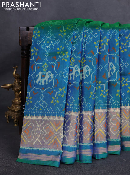 Rajkot Patola Silk Saree teal blue with allover Ikat weaves and ikat zari woven border