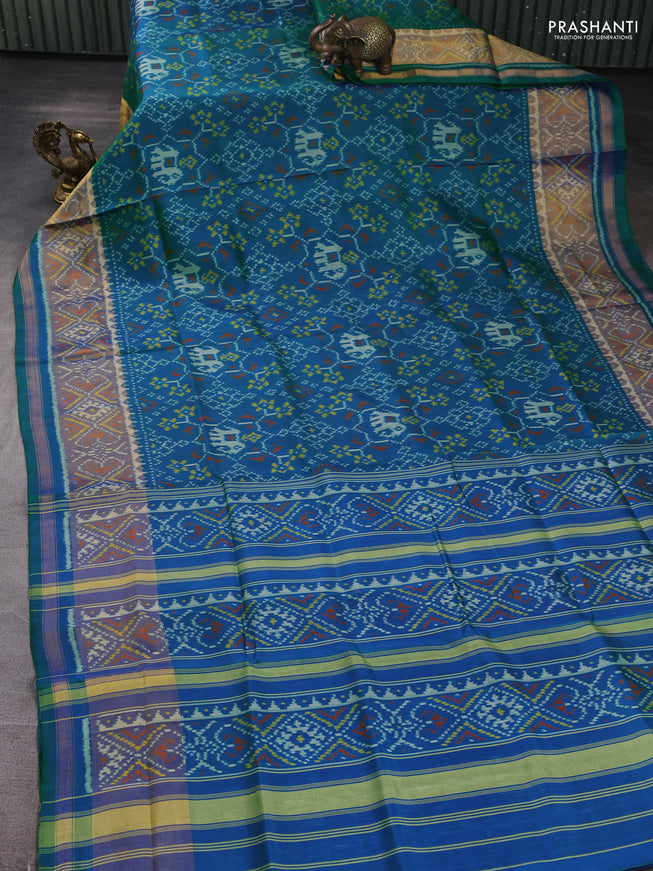 Rajkot Patola Silk Saree teal blue with allover Ikat weaves and ikat zari woven border