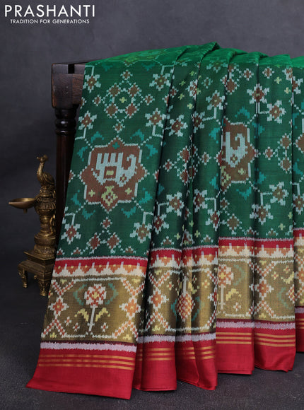 Rajkot Patola Silk Saree green and maroon with allover Ikat weaves and ikat zari woven border