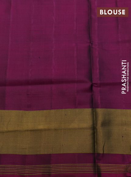 Rajkot Patola Silk Saree cs blue and purple with allover Ikat weaves and ikat zari woven border