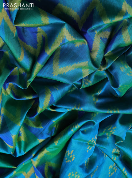 Rajkot Patola Silk Saree teal blue with allover Ikat weaves & Jute finished and zari woven border