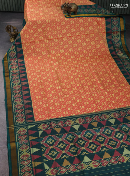Rajkot Patola Silk Saree peach shade and peacock green with allover Ikat weaves and ikat zari woven border