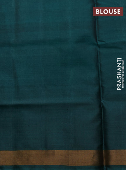 Rajkot Patola Silk Saree peach shade and peacock green with allover Ikat weaves and ikat zari woven border