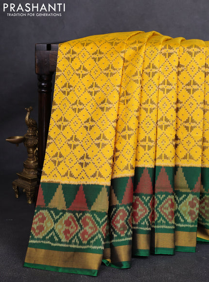 Rajkot Patola Silk Saree mustard yellow and green with allover Ikat weaves and ikat zari woven border