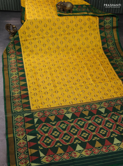 Rajkot Patola Silk Saree mustard yellow and green with allover Ikat weaves and ikat zari woven border