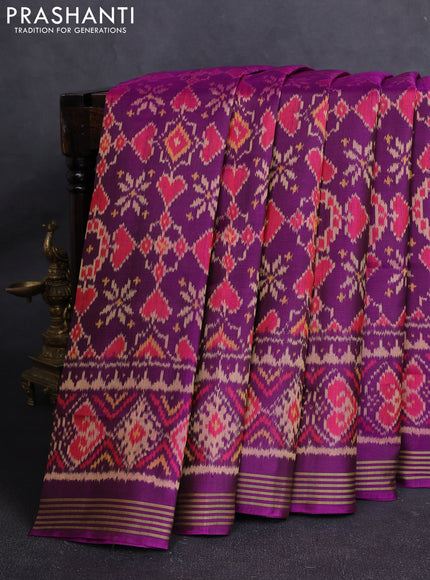 Rajkot Patola Silk Saree purple with allover Ikat weaves and ikat zari woven border