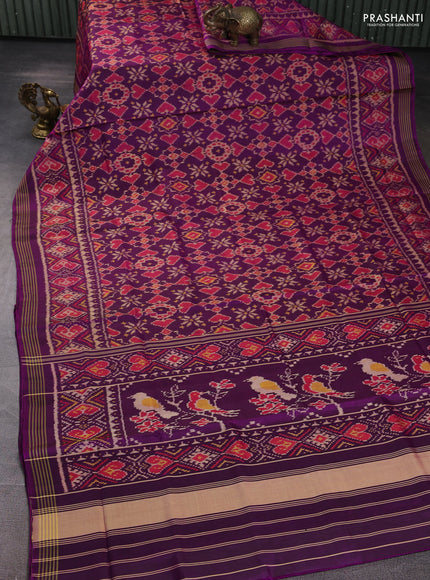 Rajkot Patola Silk Saree purple with allover Ikat weaves and ikat zari woven border