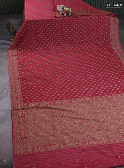 Banarasi Art Georgette Saree Dark peach with woven buttas and woven border