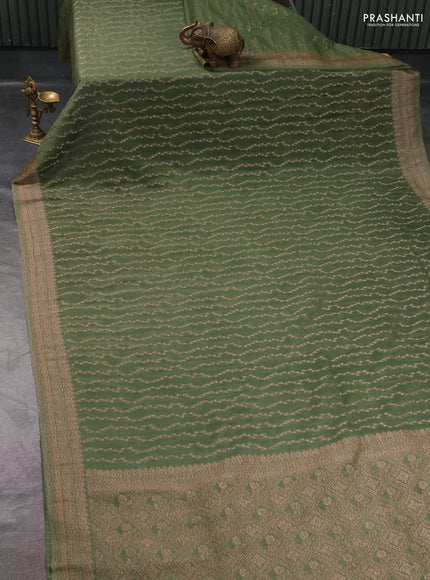 Banarasi Art Georgette Saree pastel green with allover thread & zari weaves and woven border