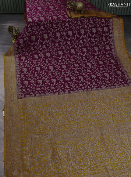 Banarasi Art Georgette Saree purple and orange with allover thread & zari weaves and woven border