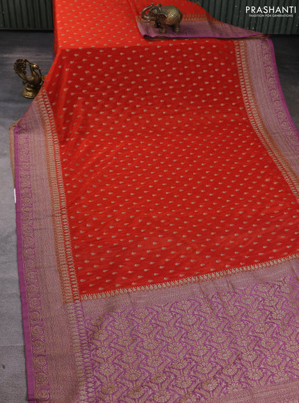 Banarasi Art Georgette Saree orange and mauve pink with woven buttas and woven border