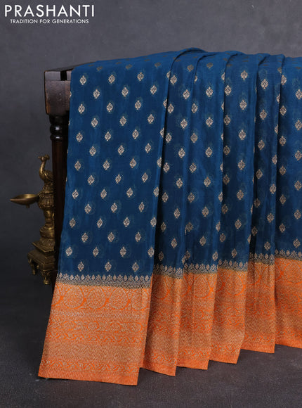 Banarasi Art Georgette Saree peacock blue and orange with woven buttas and woven border