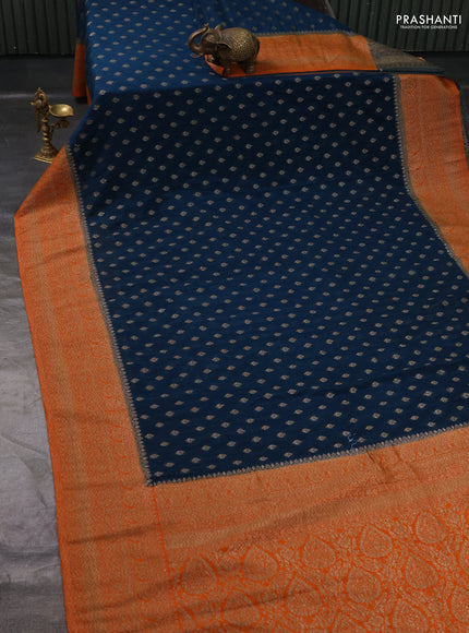 Banarasi Art Georgette Saree peacock blue and orange with woven buttas and woven border