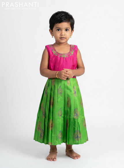 Pure silk kids Lehenga pink and parrot green with embroidery neck pattern and sleeveless style