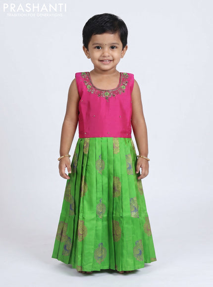 Pure silk kids Lehenga pink and parrot green with embroidery neck pattern and sleeveless style