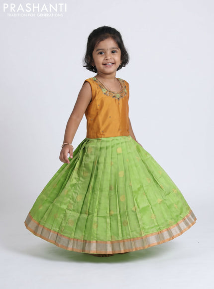 Pure silk kids Lehenga dark mustard and pista green with embroidery neck pattern and sleeveless style