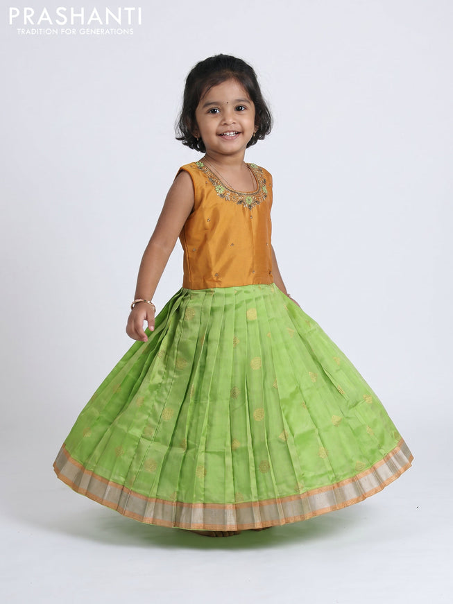 Pure silk kids Lehenga dark mustard and pista green with embroidery neck pattern and sleeveless style