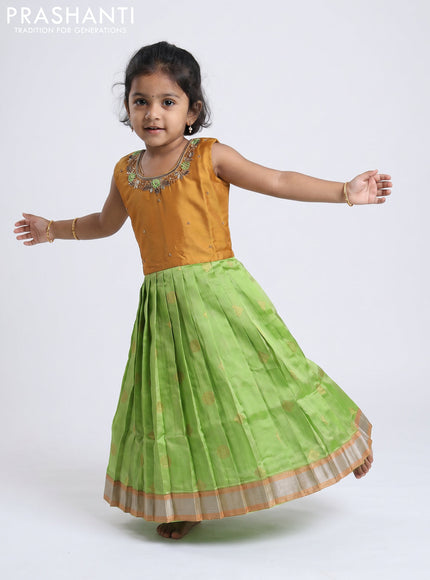 Pure silk kids Lehenga dark mustard and pista green with embroidery neck pattern and sleeveless style