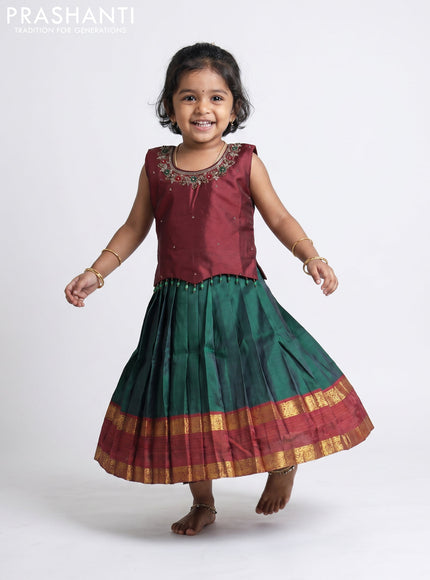 Pure silk kids Lehenga maroon and bottle green with embroidery neck pattern and sleeveless style