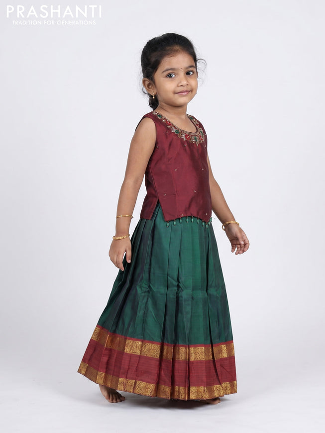 Pure silk kids Lehenga maroon and bottle green with embroidery neck pattern and sleeveless style