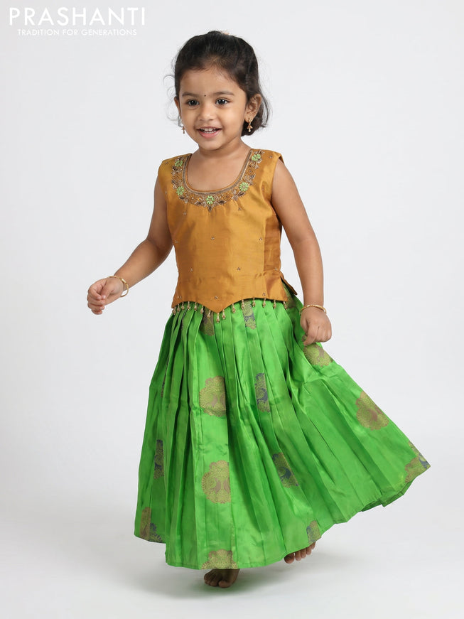 Pure silk kids Lehenga dark mustard and parrot green with embroidery neck pattern and sleeveless style
