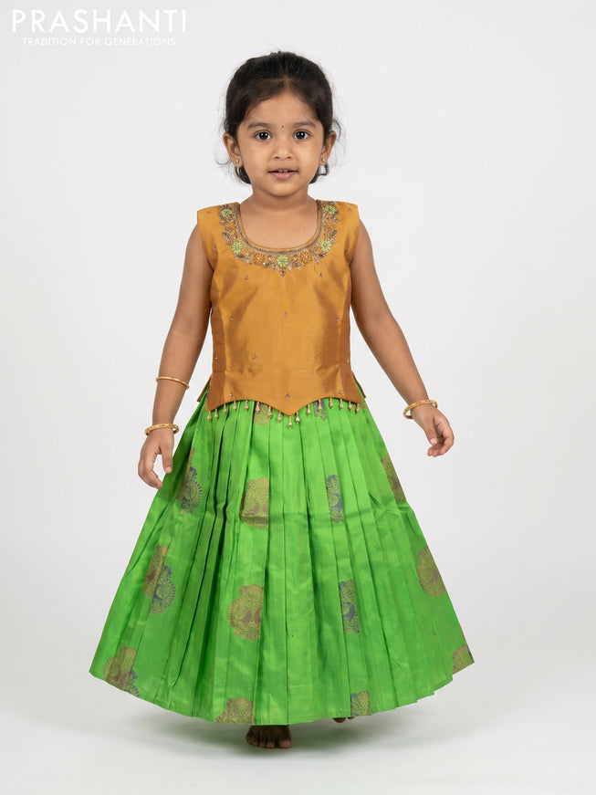 Pure silk kids Lehenga dark mustard and parrot green with embroidery neck pattern and sleeveless style