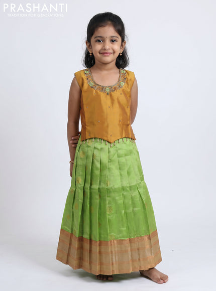 Pure silk kids Lehenga dark mustard and pista green with embroidery neck pattern and sleeveless style