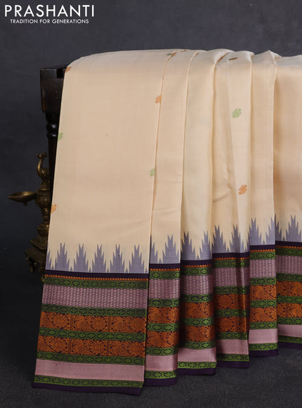 Pure kanchipuram silk saree cream and deep violet with thread woven buttas and temple design thread woven border