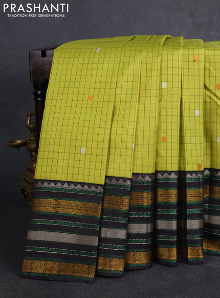 Pure kanchipuram silk saree pista green and black with allover checks & buttas and thread woven border