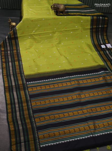 Pure kanchipuram silk saree pista green and black with allover checks & buttas and thread woven border