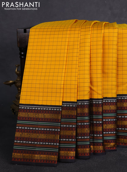 Pure kanchipuram silk saree yellow and black with allover checked pattern and thread woven border