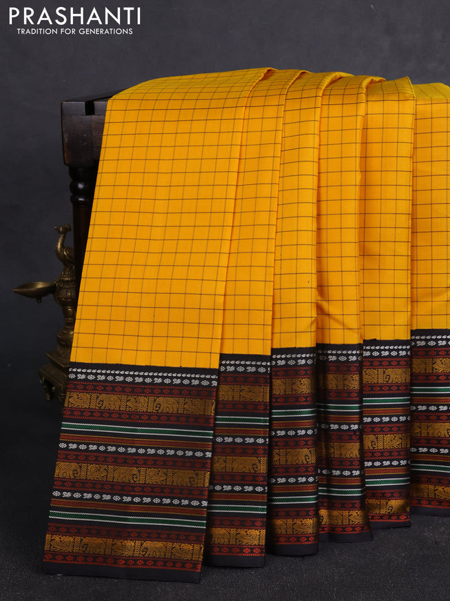 Pure kanchipuram silk saree yellow and black with allover checked pattern and thread woven border