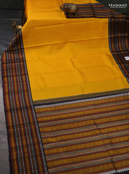 Pure kanchipuram silk saree yellow and black with allover checked pattern and thread woven border