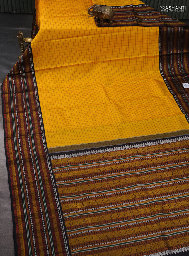 Pure kanchipuram silk saree yellow and black with allover checked pattern and thread woven border