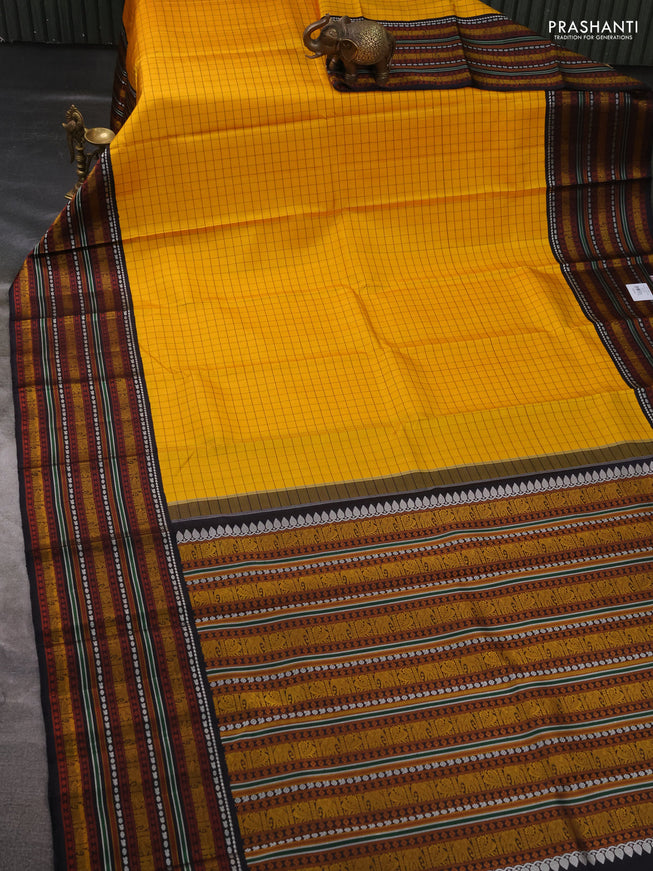 Pure kanchipuram silk saree yellow and black with allover checked pattern and thread woven border