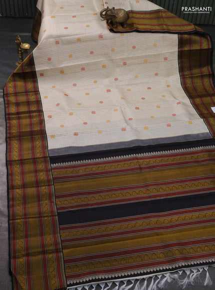 Pure kanchipuram silk saree beige and black with allover checks & buttas and thread woven border