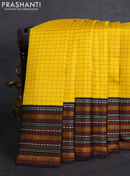 Pure kanchipuram silk saree yellow and black with allover checked pattern and thread woven border