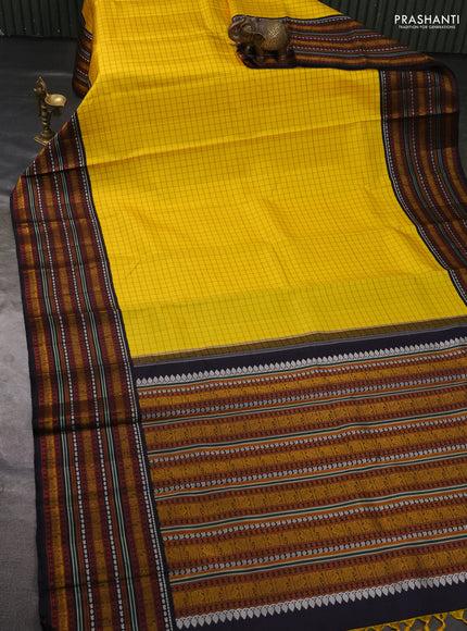 Pure kanchipuram silk saree yellow and black with allover checked pattern and thread woven border