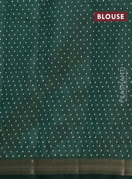 Semi raw silk saree bottle green with allover geometric prints and zari woven border