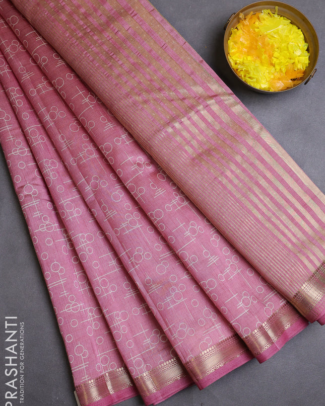 Semi raw silk saree pastel pink with allover geometric prints and zari woven border