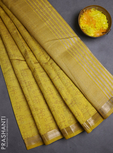 Semi raw silk saree lime yellow with allover geometric prints and zari woven border