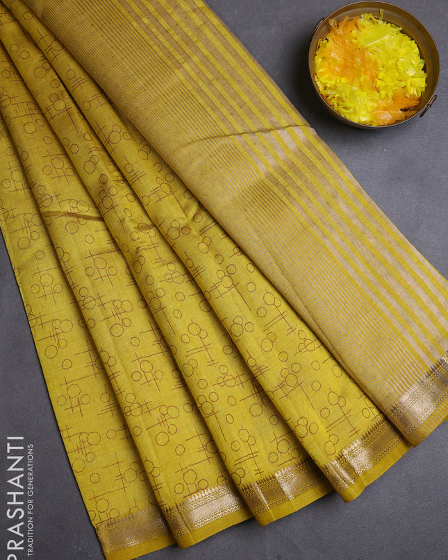 Semi raw silk saree lime yellow with allover geometric prints and zari woven border