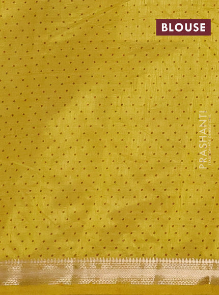 Semi raw silk saree lime yellow with allover geometric prints and zari woven border